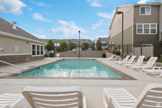 2335 W Cresthaven Ln, Lehi, UT 84043 - community pool with a residential view, a fenced backyard, and a patio