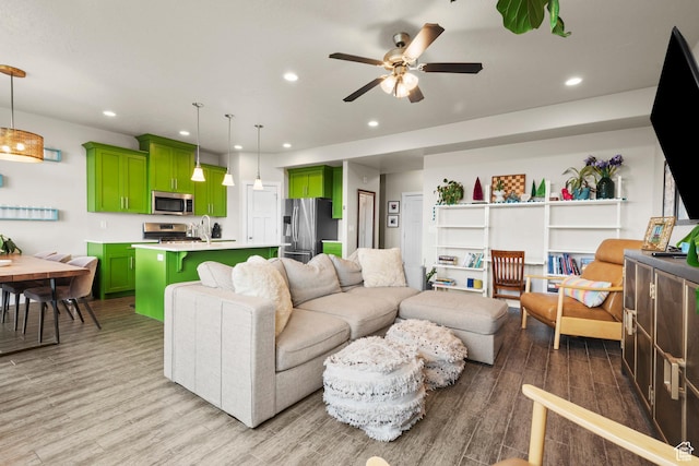 2335 W Cresthaven Ln, Lehi, UT 84043 - living area featuring ceiling fan, light wood-style floors, and recessed lighting