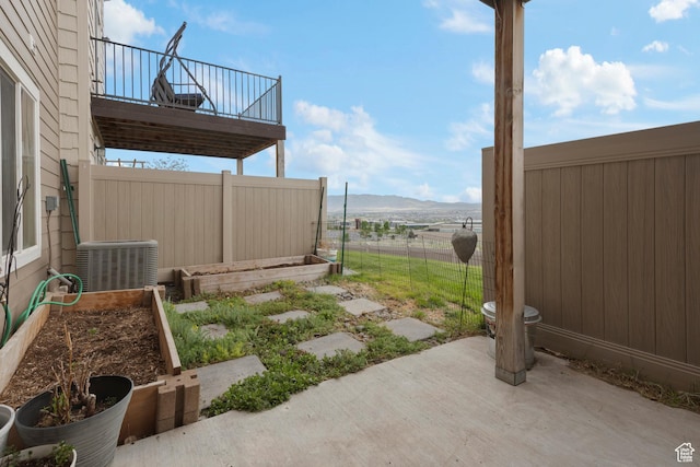 2335 W Cresthaven Ln, Lehi, UT 84043 - view of yard with central AC unit, a patio, a mountain view, and a balcony
