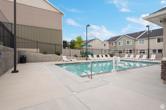 2335 W Cresthaven Ln, Lehi, UT 84043 - community pool featuring a patio area and a residential view
