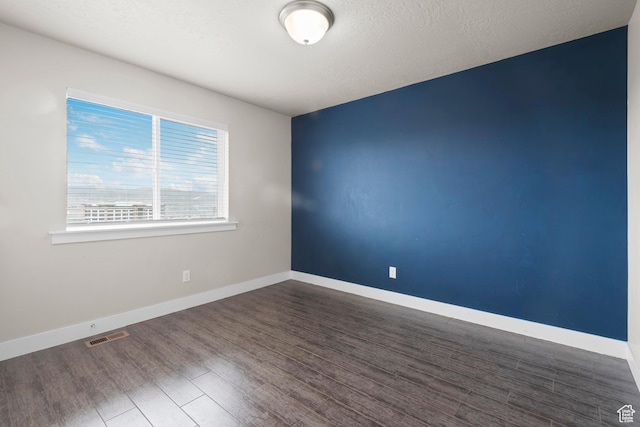 2335 W Cresthaven Ln, Lehi, UT 84043 - empty room with dark wood-style floors and baseboards