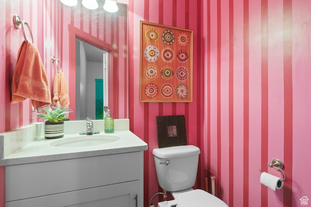 2335 W Cresthaven Ln, Lehi, UT 84043 - half bathroom with wallpapered walls, vanity, and toilet