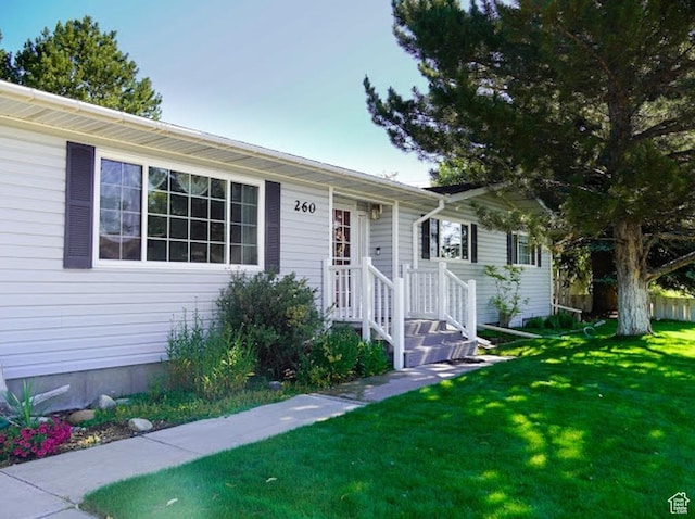 260 W 4th S, Soda Springs, ID 83276 - single story home with a front lawn