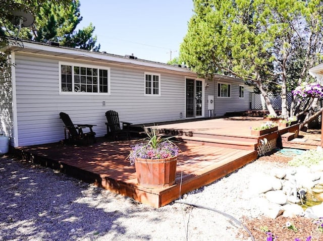 260 W 4th S, Soda Springs, ID 83276 - rear view of house with a wooden deck