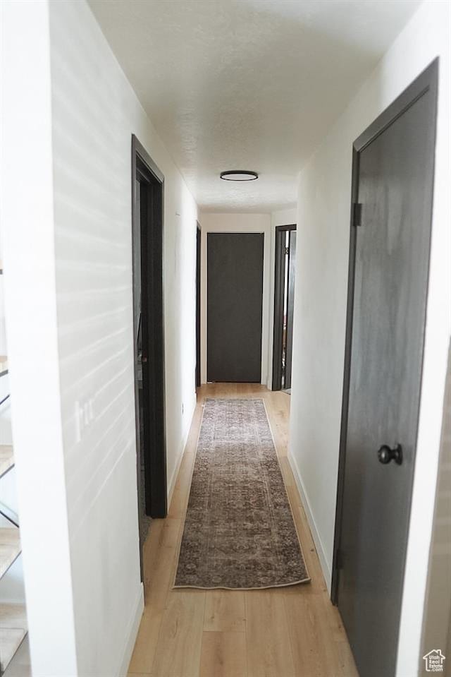431 E Hooper Ave, Soda Springs, ID 83276 - corridor with light wood-type flooring and baseboards