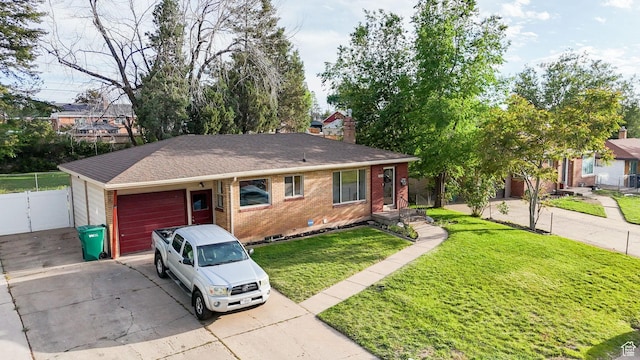 2079 W 3900 S, Roy, UT 84067 - ranch-style house with driveway, brick siding, a garage, a chimney, and roof with shingles