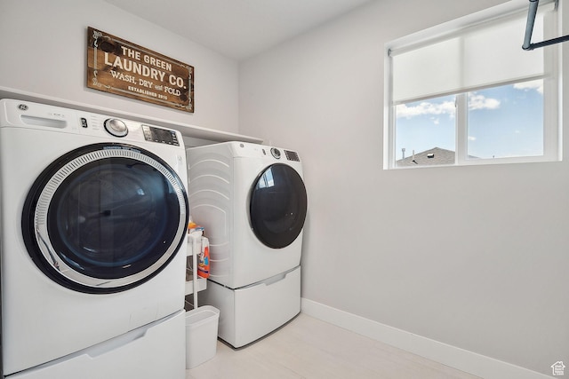 13321 S Split Oak Dr, Herriman, UT 84096 - washroom featuring separate washer and dryer and baseboards