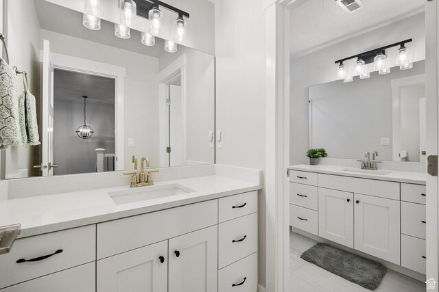 13321 S Split Oak Dr, Herriman, UT 84096 - full bath featuring two vanities