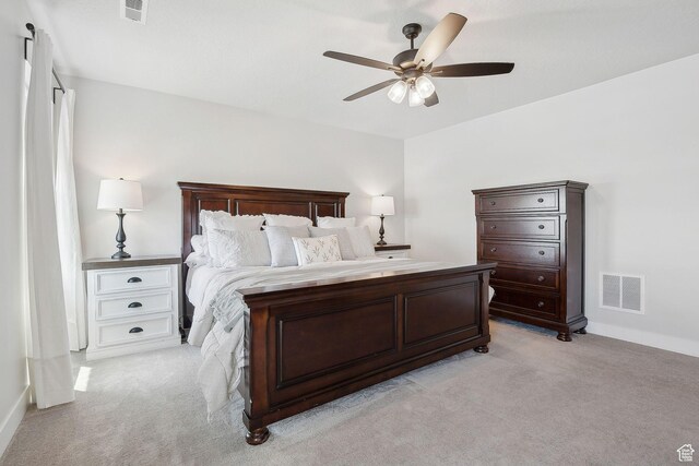13321 S Split Oak Dr, Herriman, UT 84096 - bedroom with light colored carpet, baseboards, and ceiling fan