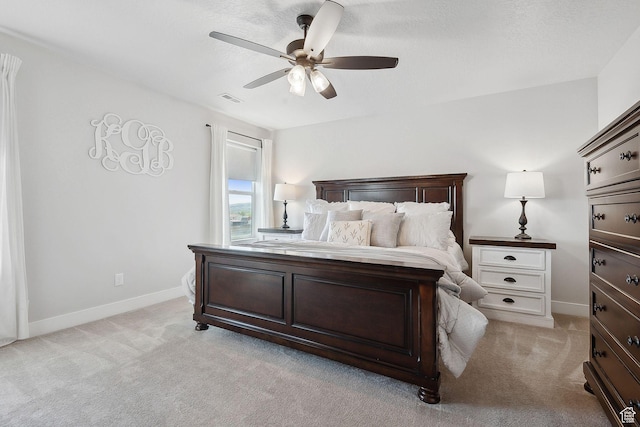 13321 S Split Oak Dr, Herriman, UT 84096 - bedroom with light carpet, baseboards, and a ceiling fan