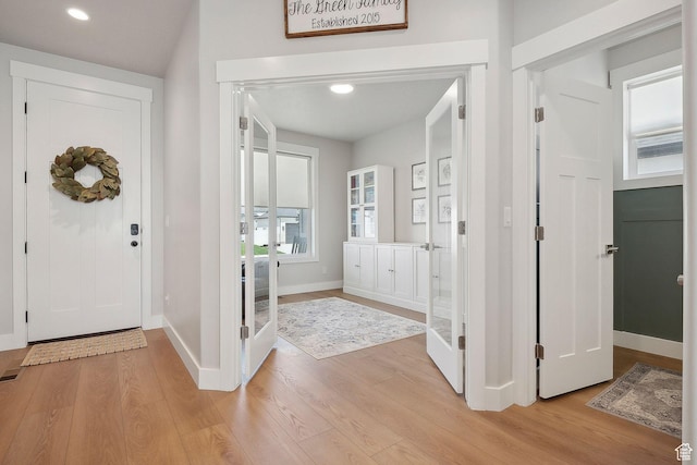 13321 S Split Oak Dr, Herriman, UT 84096 - foyer entrance featuring light wood-style floors, baseboards, and recessed lighting