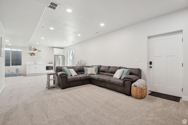 13321 S Split Oak Dr, Herriman, UT 84096 - living area featuring light colored carpet and recessed lighting