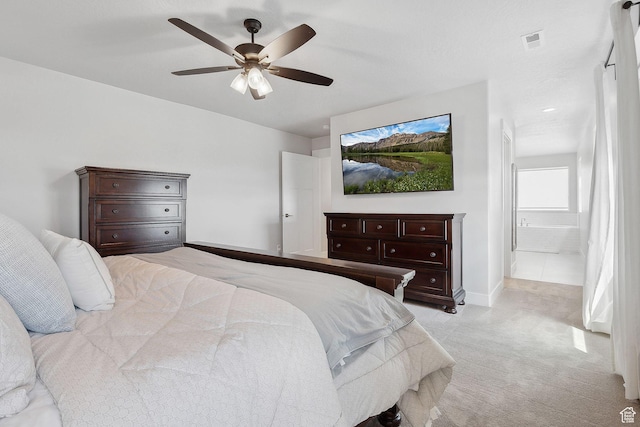 13321 S Split Oak Dr, Herriman, UT 84096 - bedroom with light carpet, baseboards, and a ceiling fan