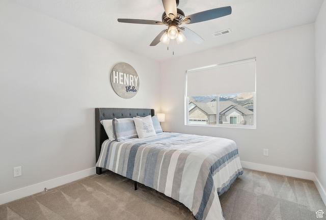 13321 S Split Oak Dr, Herriman, UT 84096 - bedroom featuring carpet flooring, baseboards, and a ceiling fan