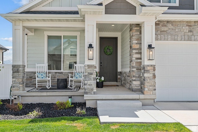 13321 S Split Oak Dr, Herriman, UT 84096 - property entrance featuring covered porch, stone siding, and board and batten siding