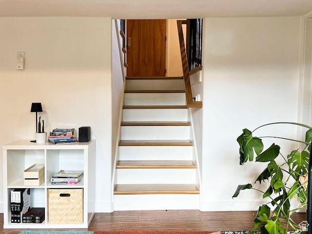 5466 S Woodcrest Dr, Holladay, UT 84117 - staircase featuring wood finished floors and baseboards