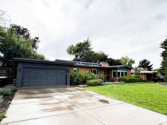 5466 S Woodcrest Dr, Holladay, UT 84117 - single story home with an attached garage, driveway, a chimney, a front lawn, and brick siding