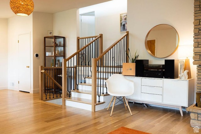 5466 S Woodcrest Dr, Holladay, UT 84117 - stairs with wood finished floors and baseboards