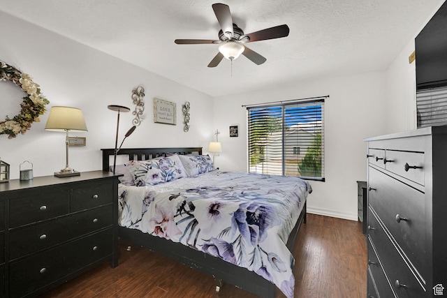 1240 N 2525 W, Layton, UT 84041 - bedroom with dark wood-style flooring, a ceiling fan, and baseboards