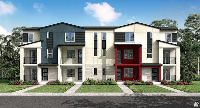 937 W Coalburn Way Unit 102, Murray, UT 84123 - view of front facade featuring a front lawn and a balcony