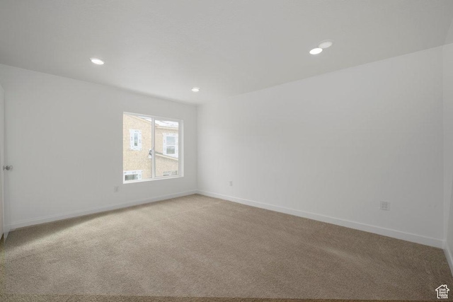 937 W Coalburn Way Unit 102, Murray, UT 84123 - unfurnished room with light colored carpet, baseboards, and recessed lighting