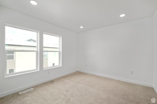 937 W Coalburn Way Unit 102, Murray, UT 84123 - unfurnished room with light colored carpet, baseboards, and recessed lighting