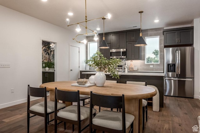 937 W Coalburn Way Unit 102, Murray, UT 84123 - dining room with baseboards, plenty of natural light, dark wood finished floors, and recessed lighting