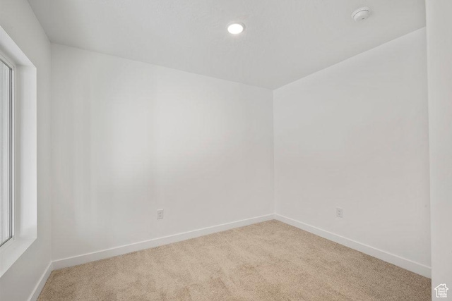 937 W Coalburn Way Unit 102, Murray, UT 84123 - unfurnished room featuring light carpet, baseboards, recessed lighting, and a smoke detector