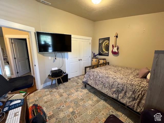 115 E 8469 S, Sandy, UT 84070 - bedroom featuring a closet and baseboards