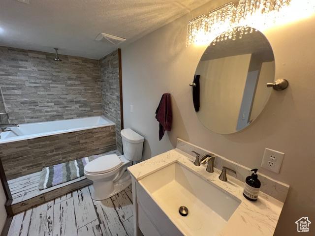 115 E 8469 S, Sandy, UT 84070 - bathroom with toilet, vanity, wood finished floors, and a combined bath / shower with rainfall shower