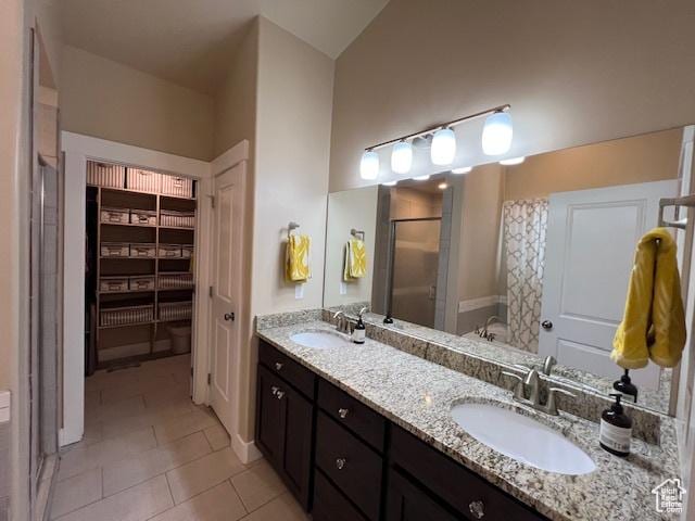 115 E 8469 S, Sandy, UT 84070 - full bath with a shower stall, double vanity, and tile patterned floors