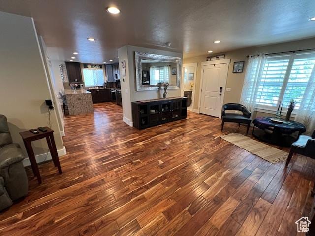 115 E 8469 S, Sandy, UT 84070 - living area featuring dark wood-style flooring and recessed lighting