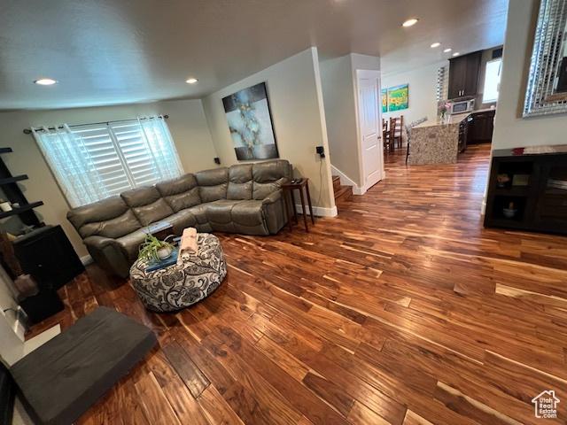115 E 8469 S, Sandy, UT 84070 - living room featuring hardwood / wood-style floors, recessed lighting, and baseboards