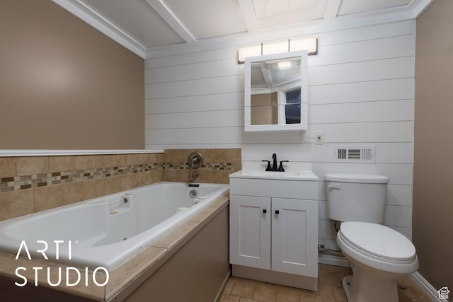 1280 N Gramercy Ave, Ogden, UT 84404 - full bathroom featuring a jetted tub, toilet, vanity, and tile patterned flooring