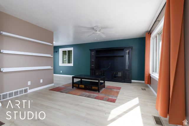 1280 N Gramercy Ave, Ogden, UT 84404 - living room with a ceiling fan, wood finished floors, and baseboards