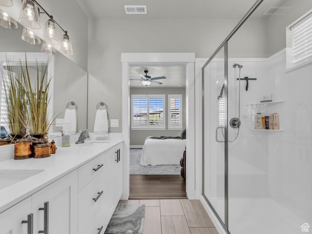 1136 W 1810 S, Orem, UT 84058 - ensuite bathroom with ceiling fan, double vanity, and a stall shower