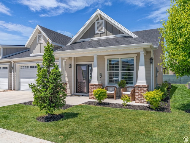 1136 W 1810 S, Orem, UT 84058 - craftsman inspired home featuring board and batten siding, a porch, driveway, an attached garage, and a front lawn