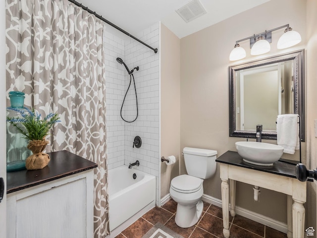 686 Idaho Ave, Provo, UT 84606 - bathroom featuring shower / bathtub combination with curtain, toilet, tile patterned floors, vanity, and baseboards