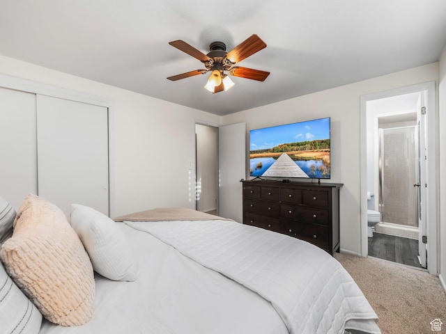 686 Idaho Ave, Provo, UT 84606 - carpeted bedroom with connected bathroom, a closet, and ceiling fan