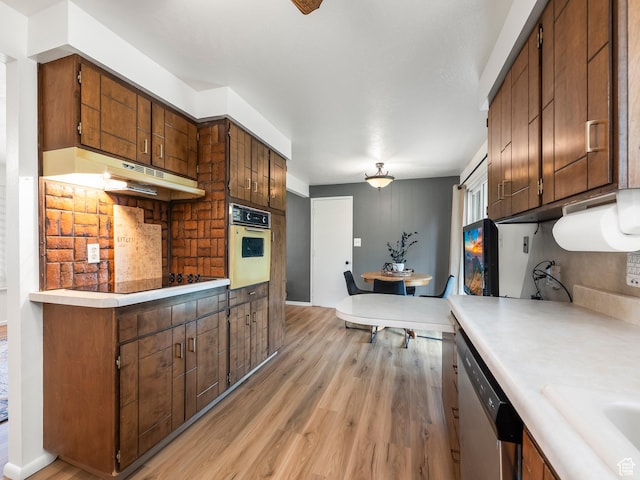 686 Idaho Ave, Provo, UT 84606 - kitchen with wall oven, dishwasher, light wood-style floors, and light countertops