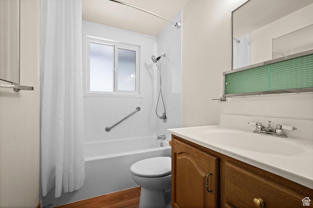 3279 W Crestfield, West Valley City, UT 84119 - bathroom featuring vanity, shower / tub combo with curtain, toilet, and wood finished floors