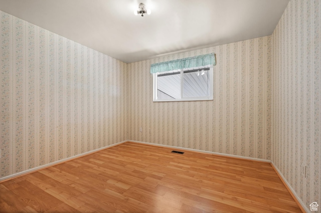 3279 W Crestfield, West Valley City, UT 84119 - unfurnished room with wood finished floors and baseboards