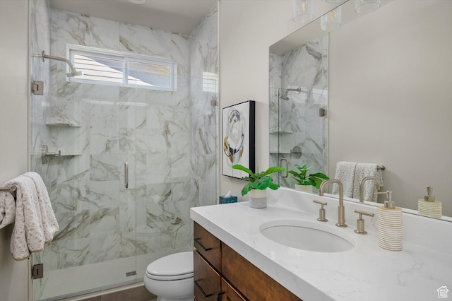 11661 N Shoreline Dr, Hideout, UT 84036 - full bathroom featuring vanity, toilet, and a marble finish shower
