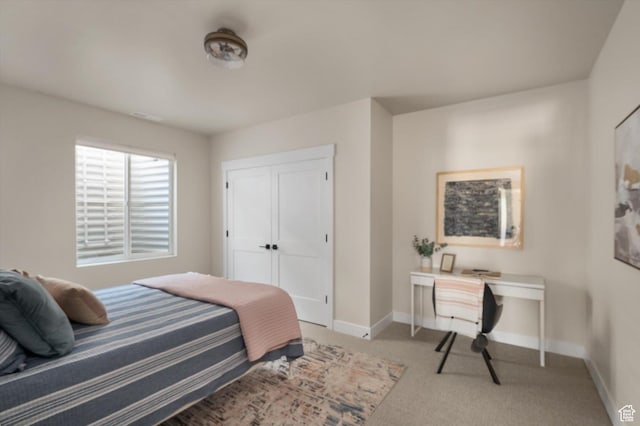 11661 N Shoreline Dr, Hideout, UT 84036 - bedroom with carpet, baseboards, an office area, and a closet