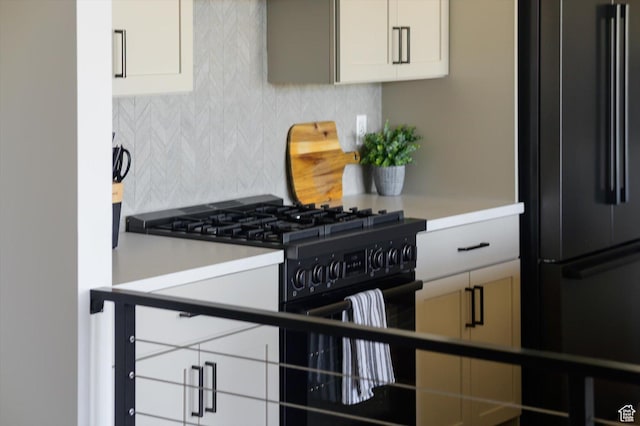 11661 N Shoreline Dr, Hideout, UT 84036 - kitchen with black appliances, backsplash, and light countertops