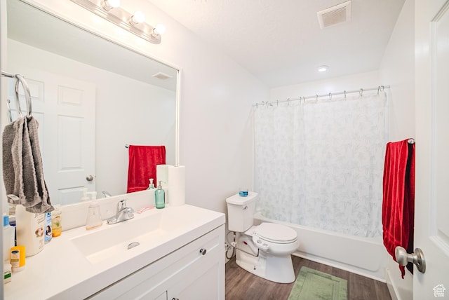 15167 S Maradona Dr, Herriman, UT 84096 - bathroom featuring wood finished floors, vanity, toilet, and shower / bath combo with shower curtain