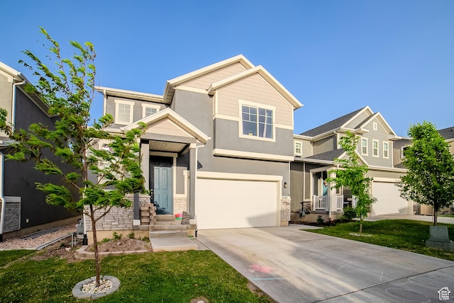 15167 S Maradona Dr, Herriman, UT 84096 - craftsman house with an attached garage, driveway, stucco siding, and a front lawn