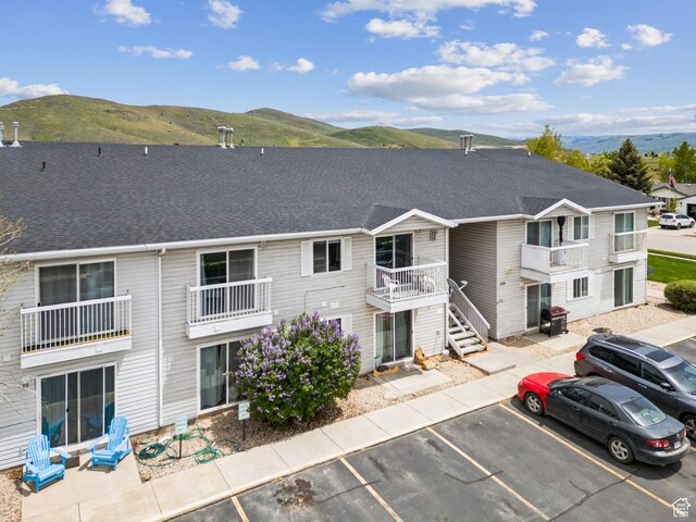 595 S Main St Unit 26, Kamas, UT 84036 - view of property featuring uncovered parking and a mountain view