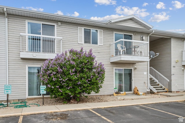 595 S Main St Unit 26, Kamas, UT 84036 - view of property with uncovered parking and stairway