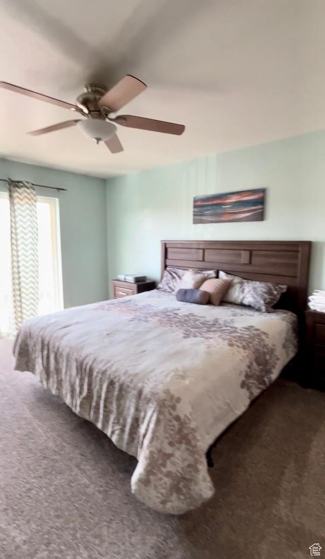 595 S Main St Unit 26, Kamas, UT 84036 - bedroom featuring carpet floors and a ceiling fan